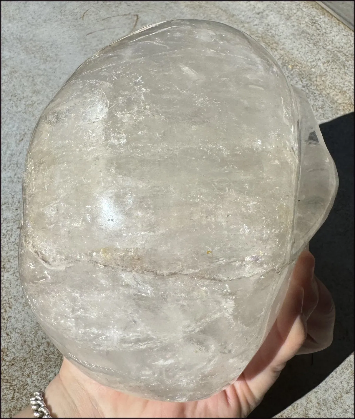 LifeSize Himalayan Quartz Crystal Skull with Multi-Colored Hematite, Shimmery Rainbows - 11lbs 