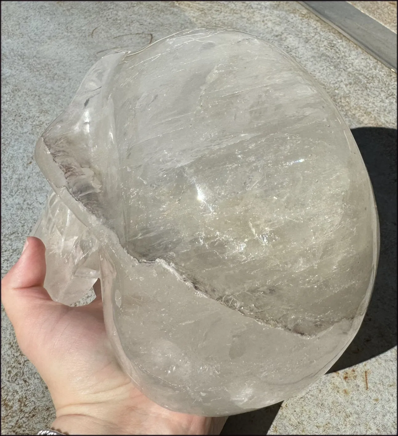 LifeSize Himalayan Quartz Crystal Skull with Multi-Colored Hematite, Shimmery Rainbows - 11lbs 