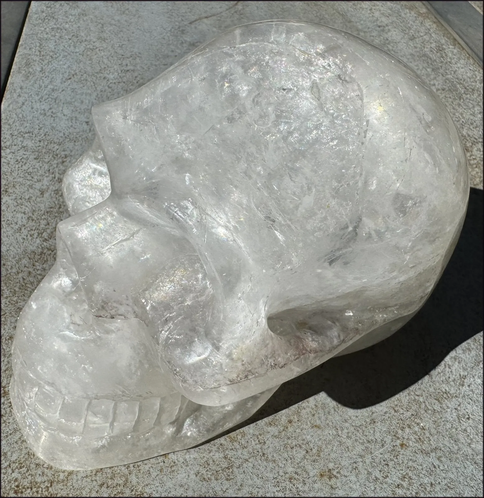 LifeSize Himalayan Quartz Crystal Skull with Multi-Colored Hematite, Shimmery Rainbows - 11lbs 