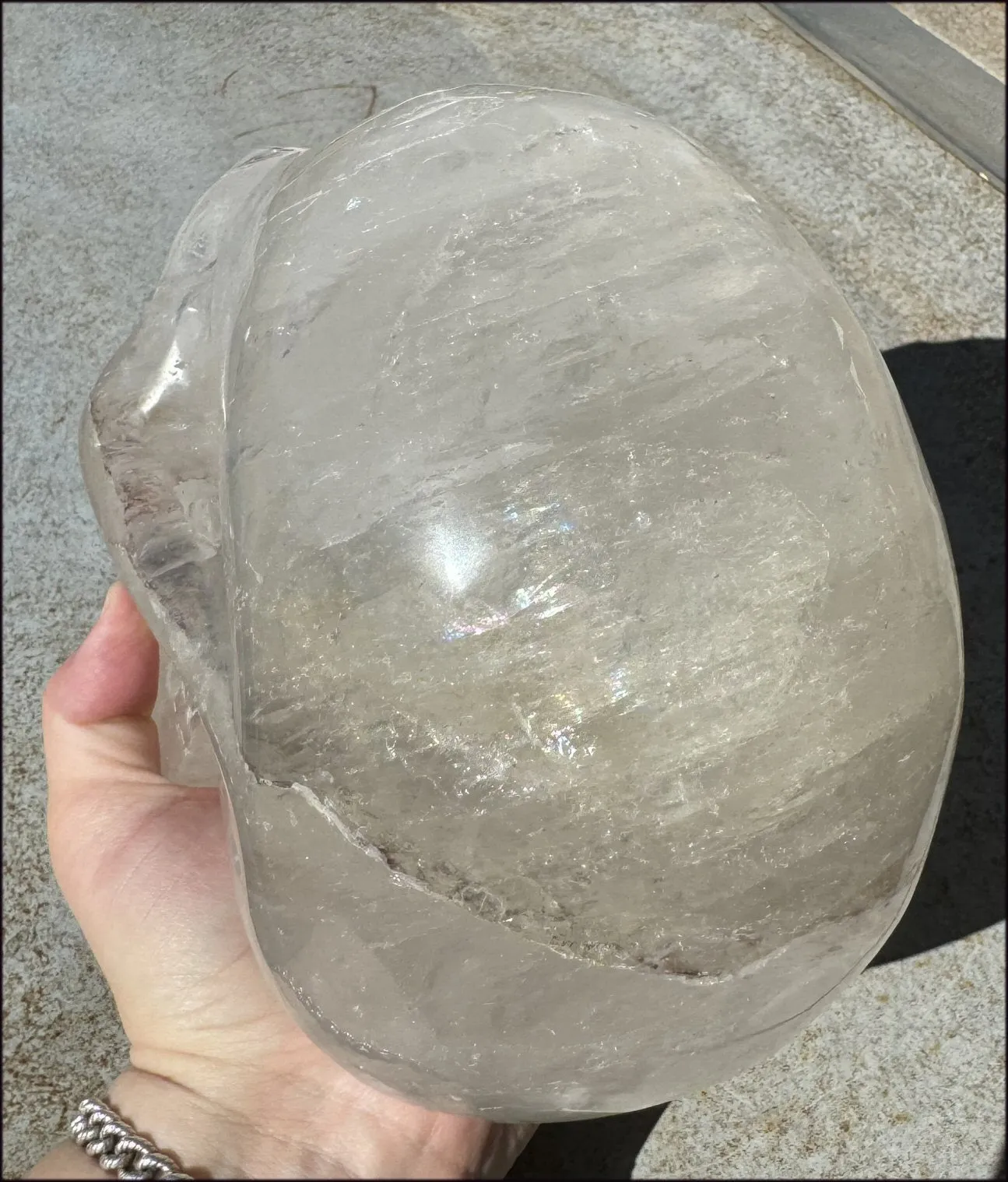 LifeSize Himalayan Quartz Crystal Skull with Multi-Colored Hematite, Shimmery Rainbows - 11lbs 