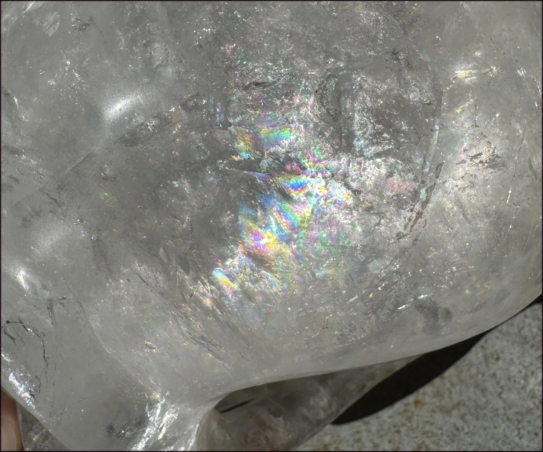 LifeSize Himalayan Quartz Crystal Skull with Multi-Colored Hematite, Shimmery Rainbows - 11lbs 