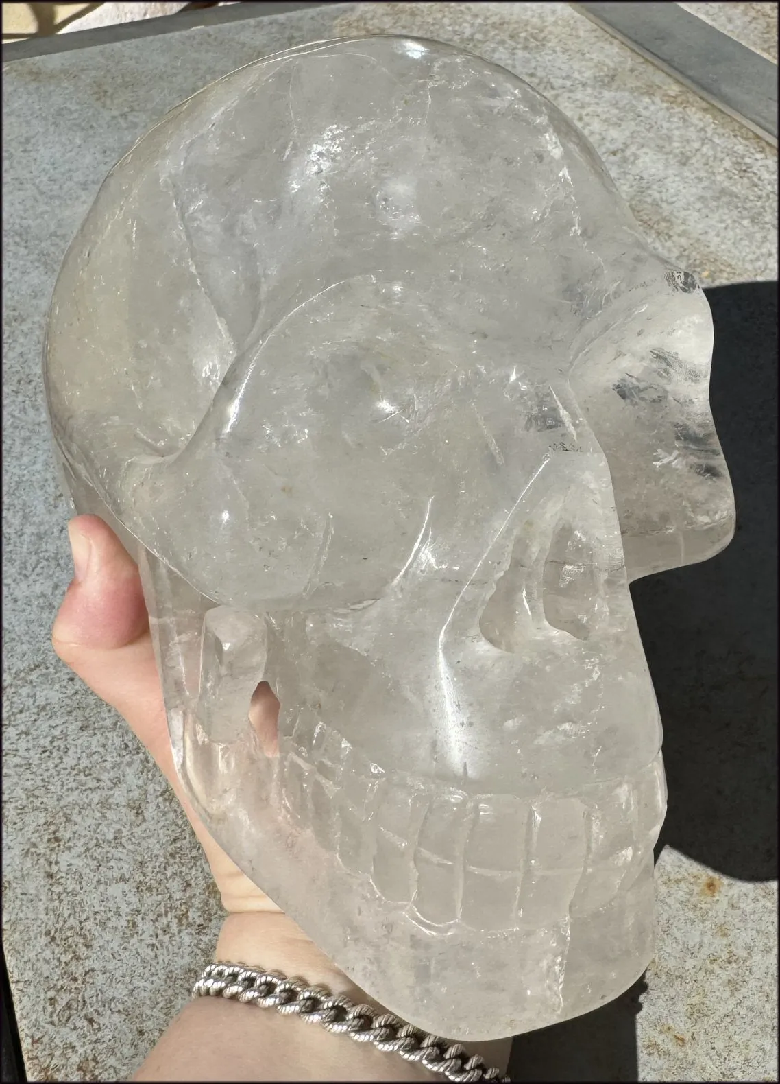 LifeSize Himalayan Quartz Crystal Skull with Multi-Colored Hematite, Shimmery Rainbows - 11lbs 