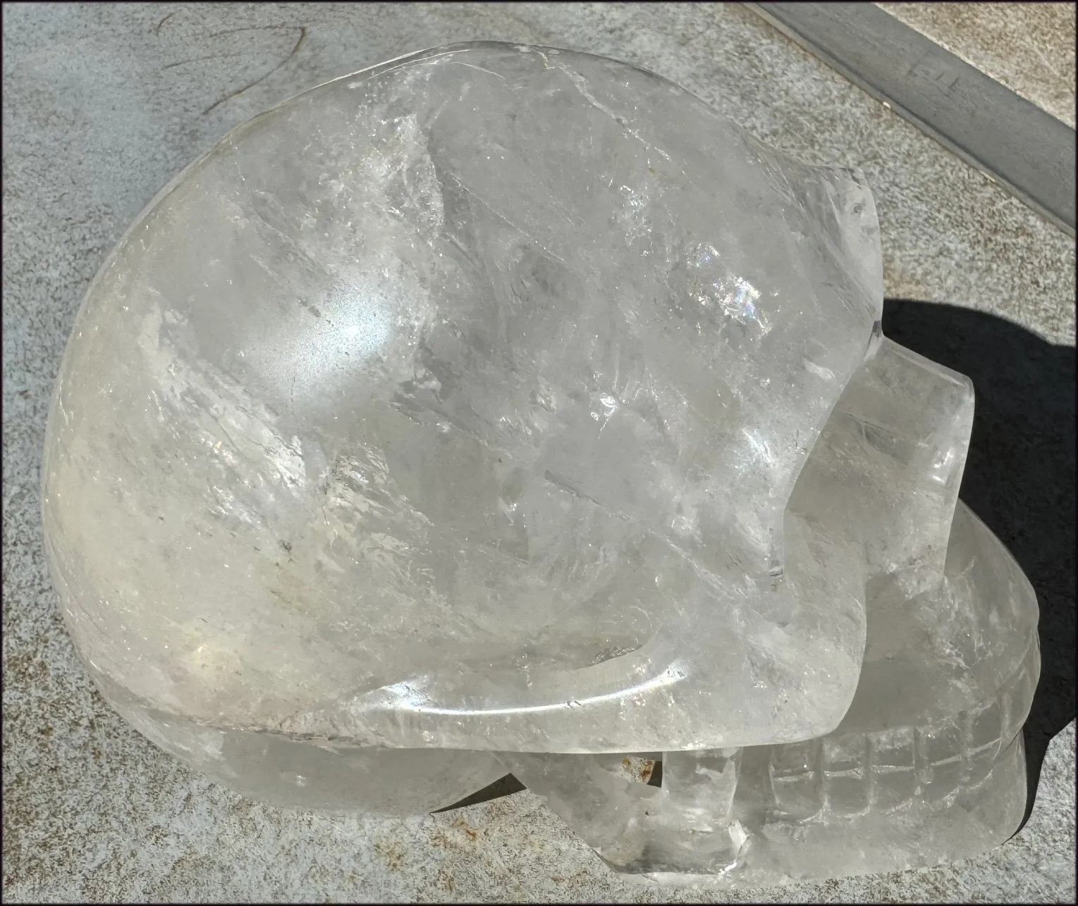 LifeSize Himalayan Quartz Crystal Skull with Multi-Colored Hematite, Shimmery Rainbows - 11lbs 