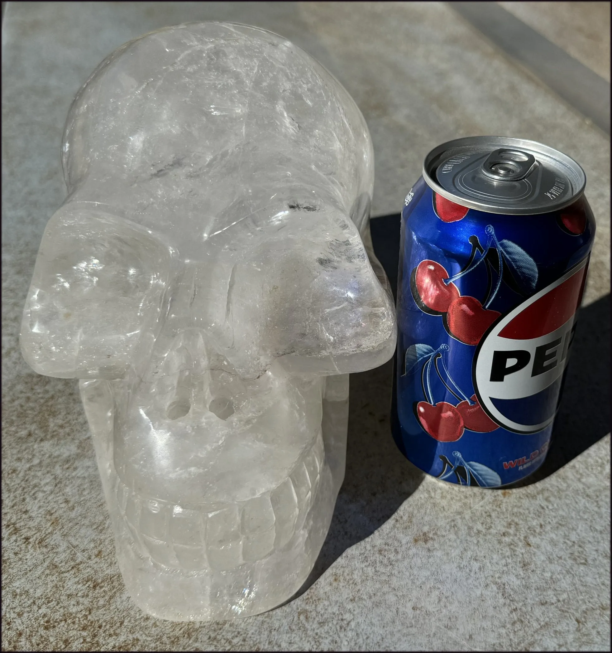 LifeSize Himalayan Quartz Crystal Skull with Multi-Colored Hematite, Shimmery Rainbows - 11lbs 