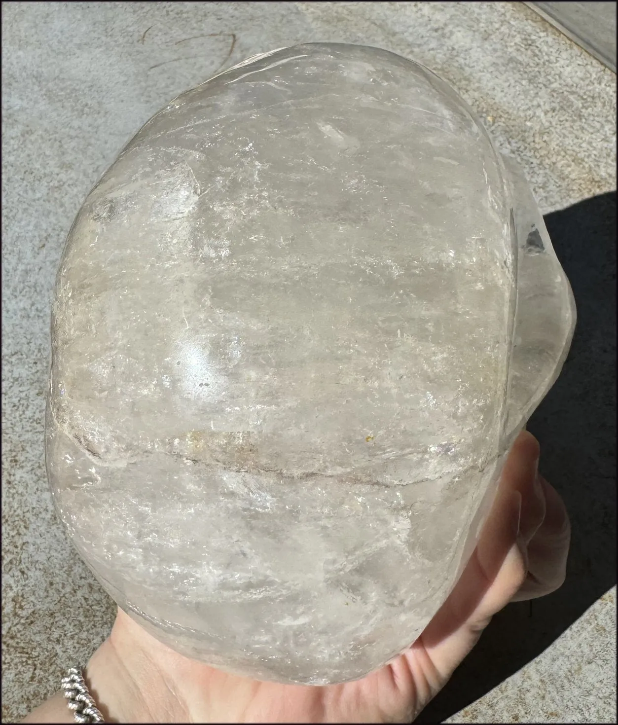 LifeSize Himalayan Quartz Crystal Skull with Multi-Colored Hematite, Shimmery Rainbows - 11lbs 
