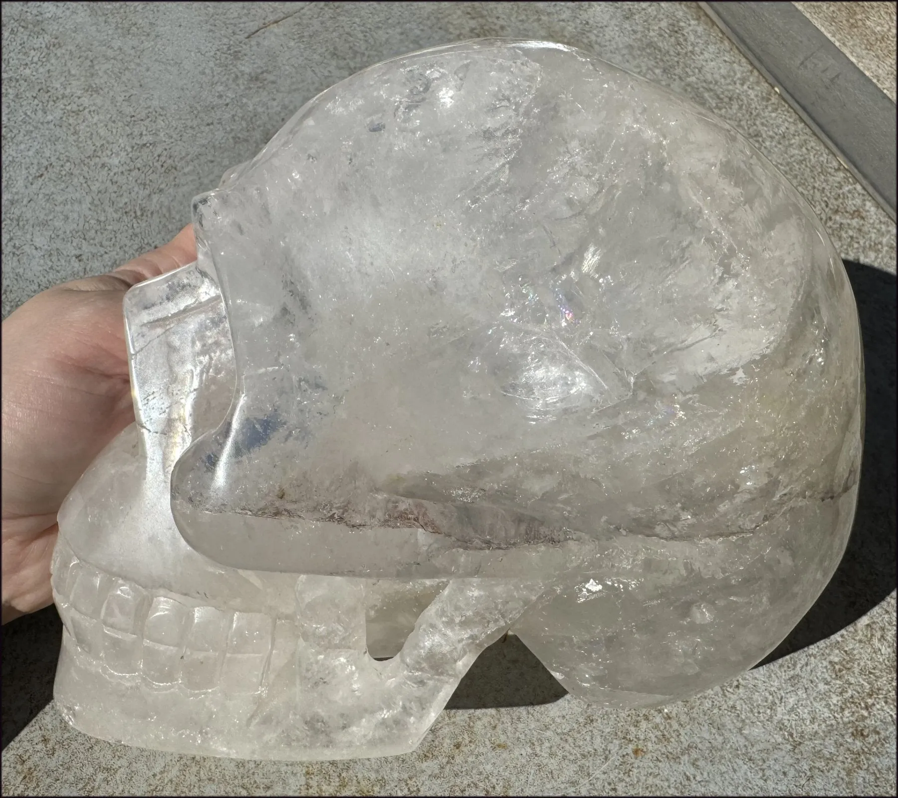 LifeSize Himalayan Quartz Crystal Skull with Multi-Colored Hematite, Shimmery Rainbows - 11lbs 