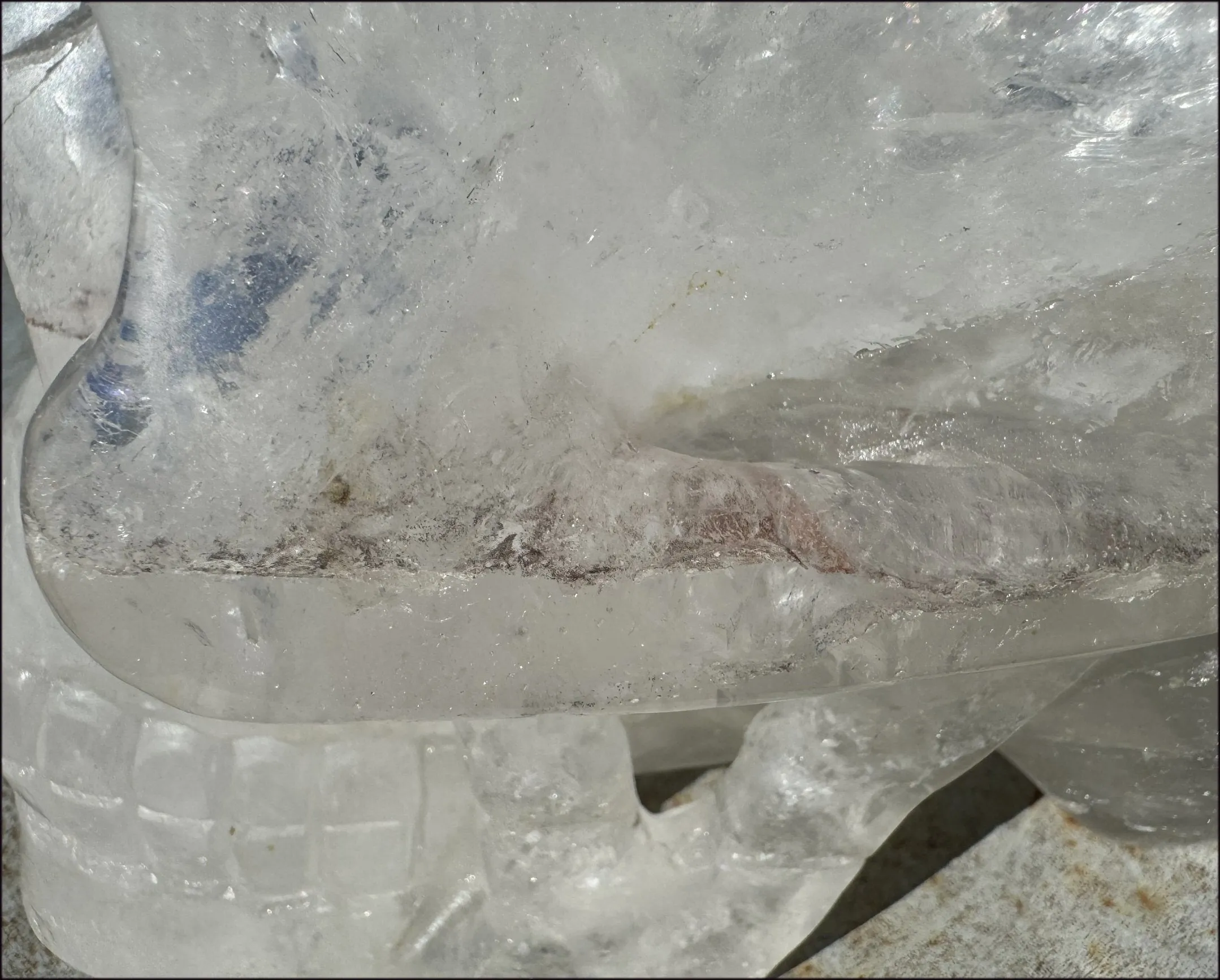 LifeSize Himalayan Quartz Crystal Skull with Multi-Colored Hematite, Shimmery Rainbows - 11lbs 