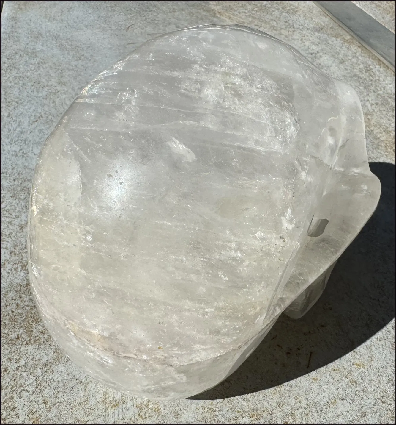 LifeSize Himalayan Quartz Crystal Skull with Multi-Colored Hematite, Shimmery Rainbows - 11lbs 