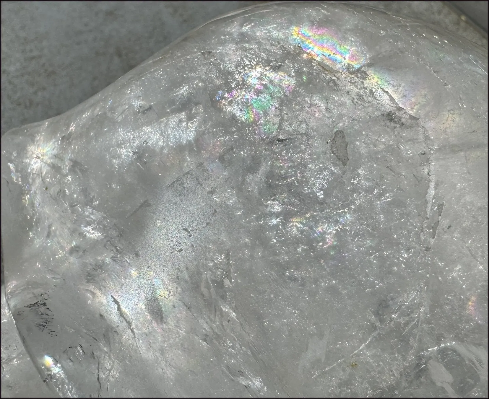 LifeSize Himalayan Quartz Crystal Skull with Multi-Colored Hematite, Shimmery Rainbows - 11lbs 