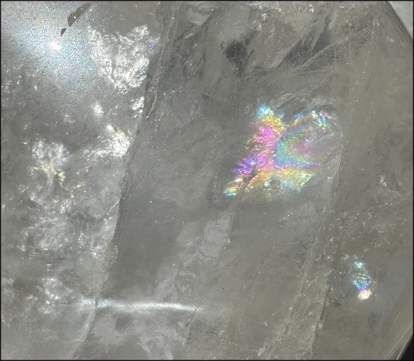 LifeSize Himalayan Quartz Crystal Skull with Multi-Colored Hematite, Shimmery Rainbows - 11lbs 