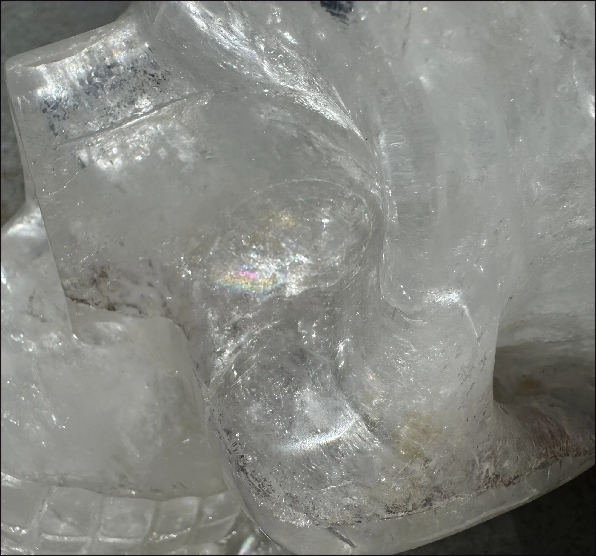 LifeSize Himalayan Quartz Crystal Skull with Multi-Colored Hematite, Shimmery Rainbows - 11lbs 
