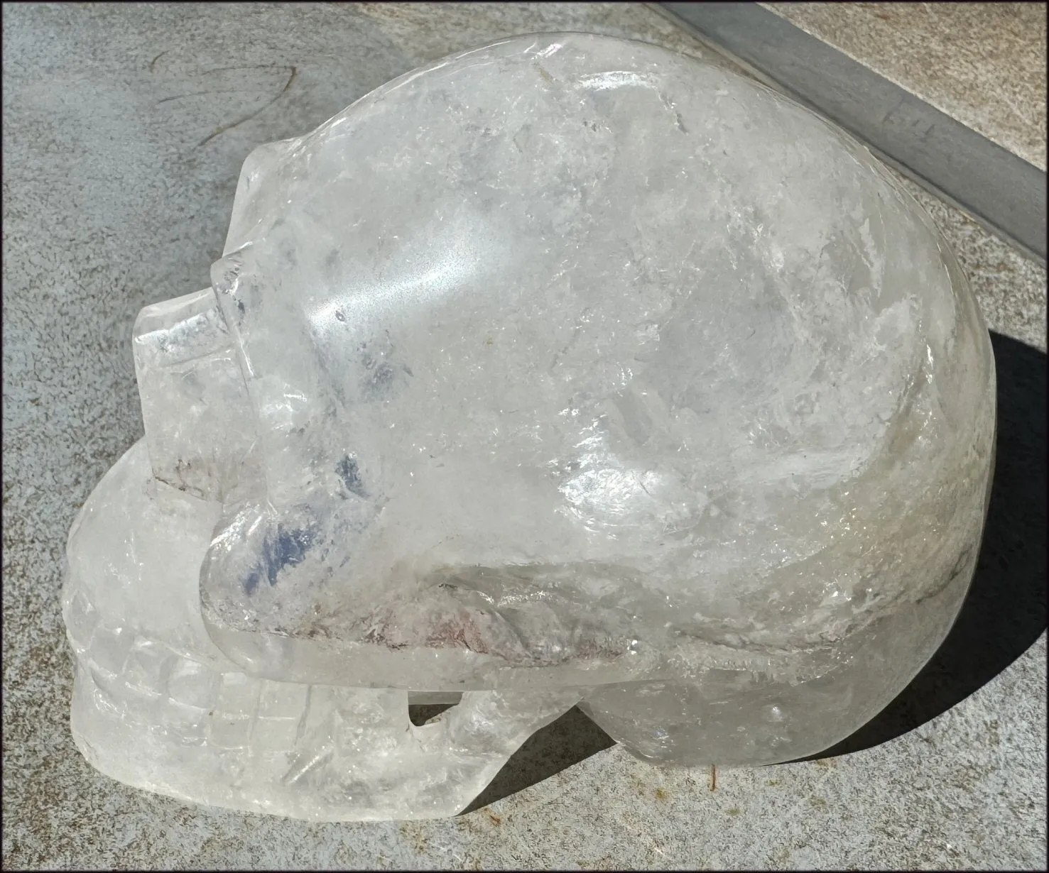 LifeSize Himalayan Quartz Crystal Skull with Multi-Colored Hematite, Shimmery Rainbows - 11lbs 