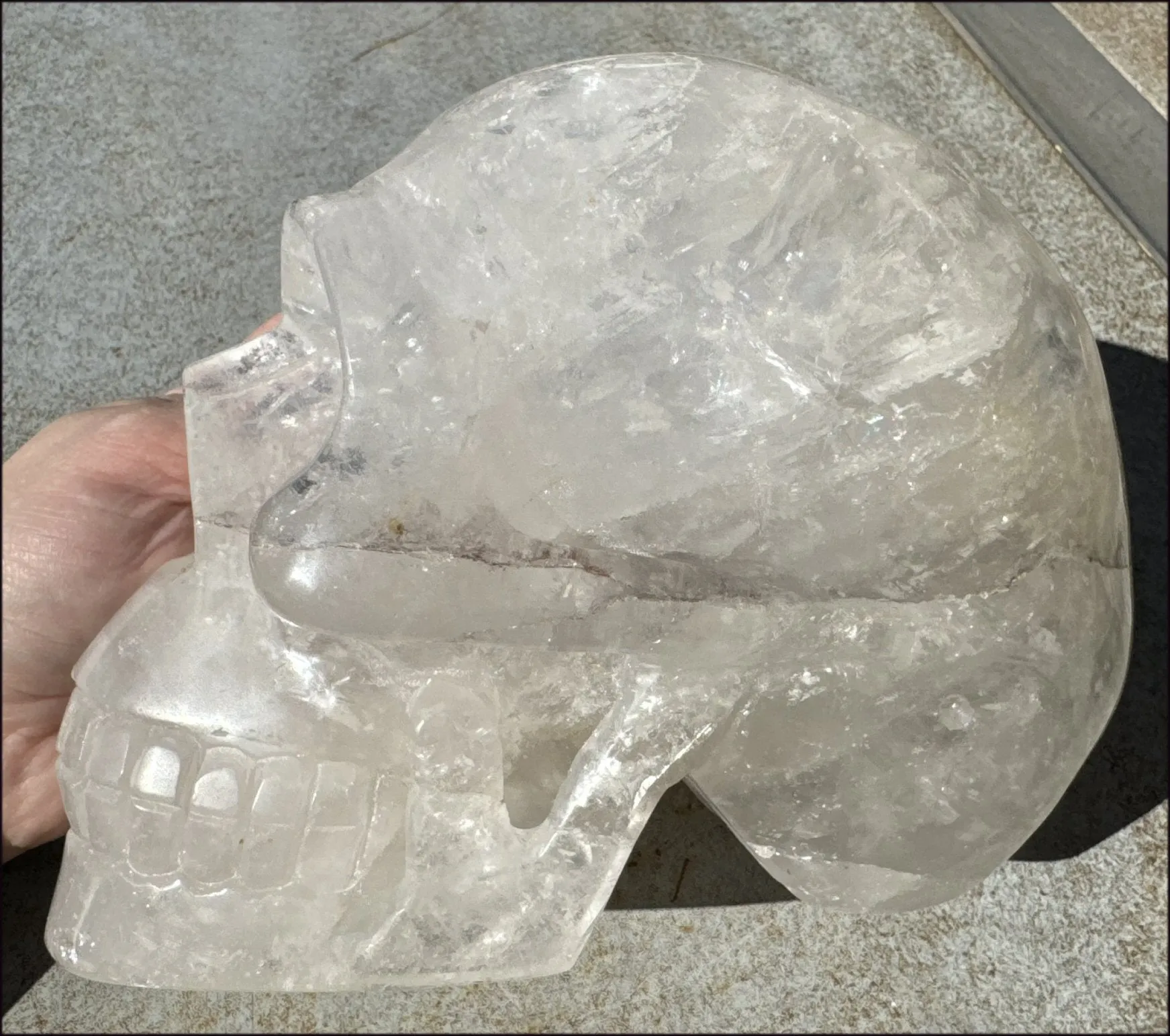 LifeSize Himalayan Quartz Crystal Skull with Multi-Colored Hematite, Shimmery Rainbows - 11lbs 