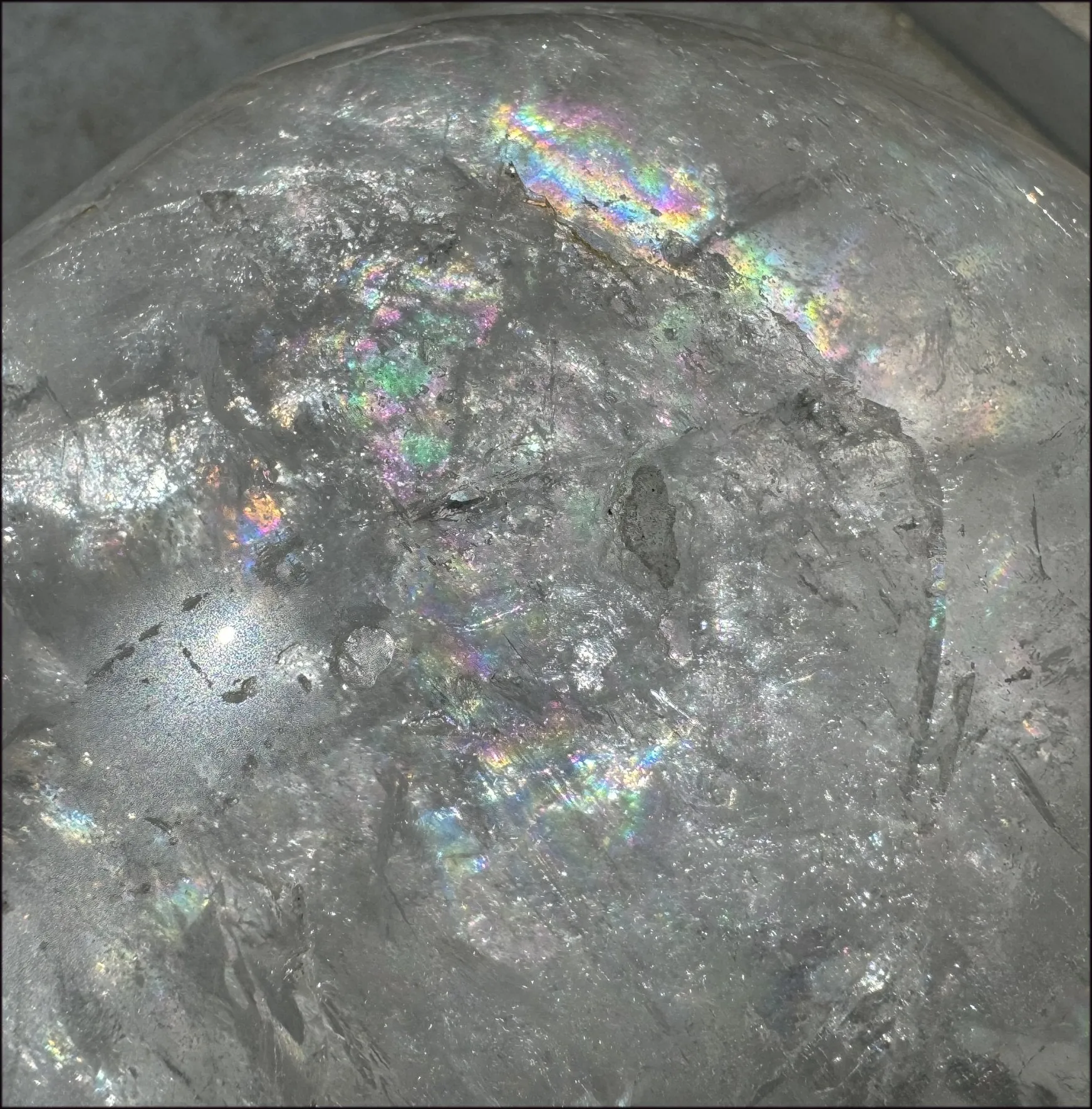 LifeSize Himalayan Quartz Crystal Skull with Multi-Colored Hematite, Shimmery Rainbows - 11lbs 