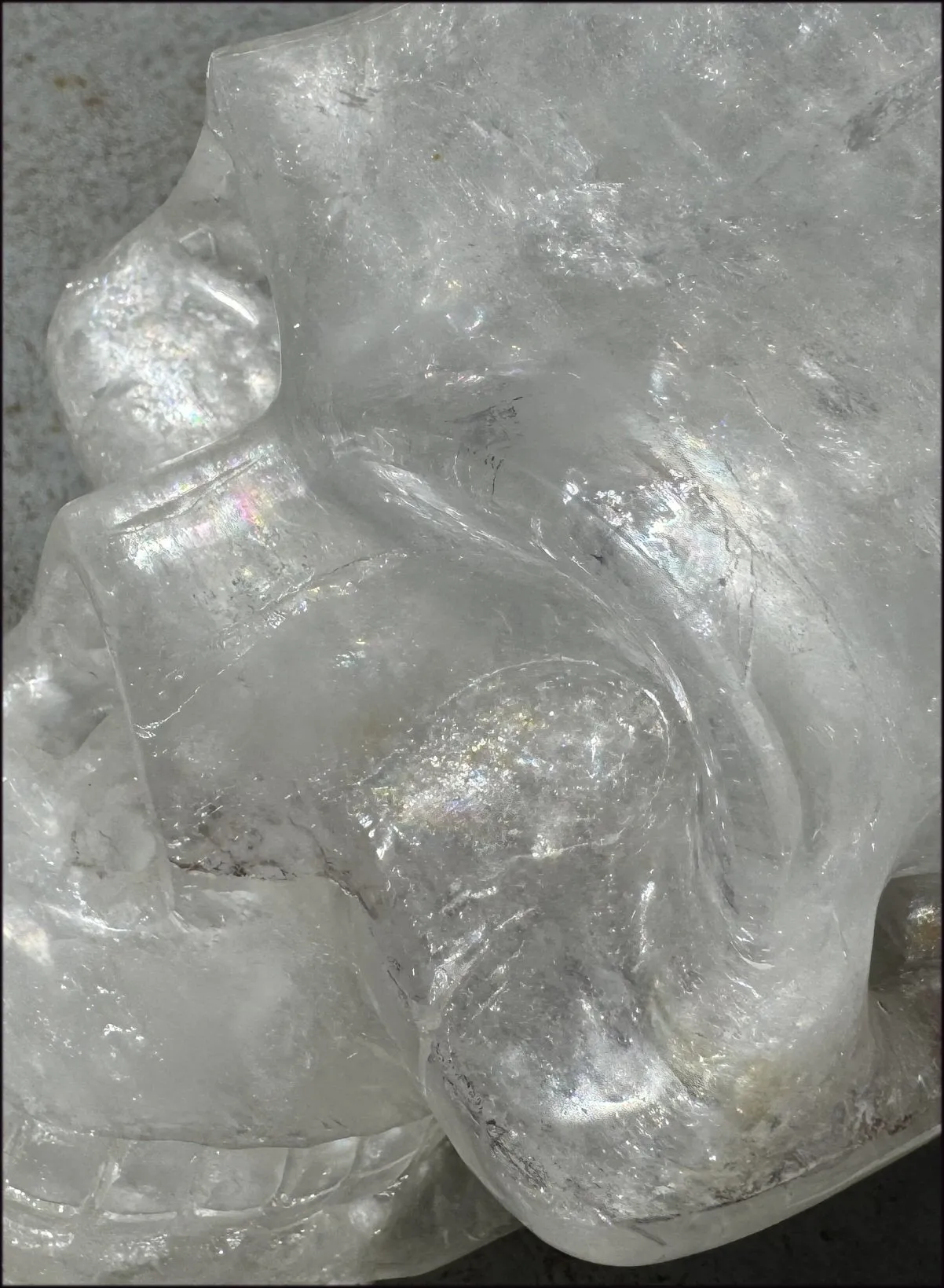 LifeSize Himalayan Quartz Crystal Skull with Multi-Colored Hematite, Shimmery Rainbows - 11lbs 