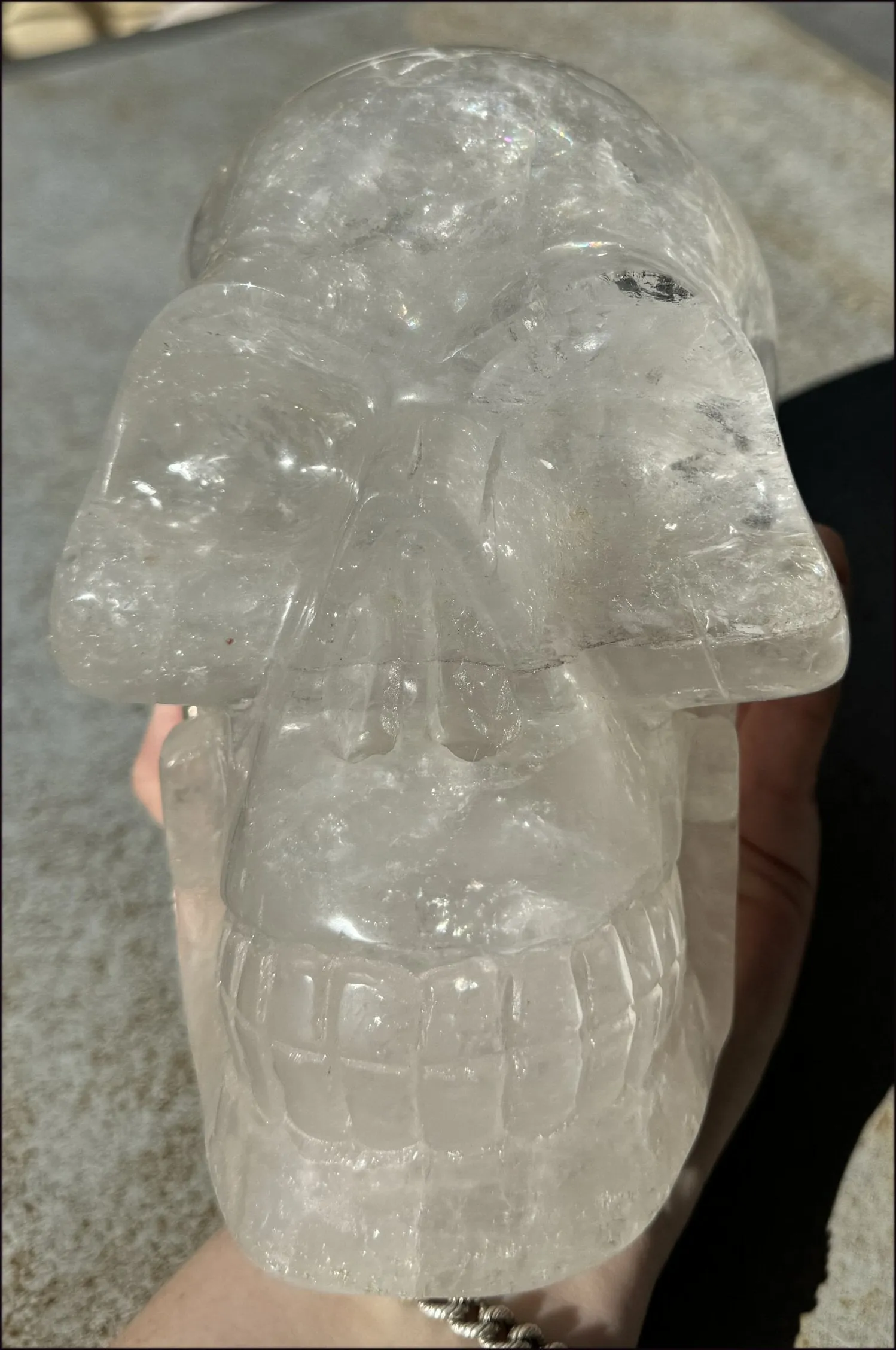 LifeSize Himalayan Quartz Crystal Skull with Multi-Colored Hematite, Shimmery Rainbows - 11lbs 
