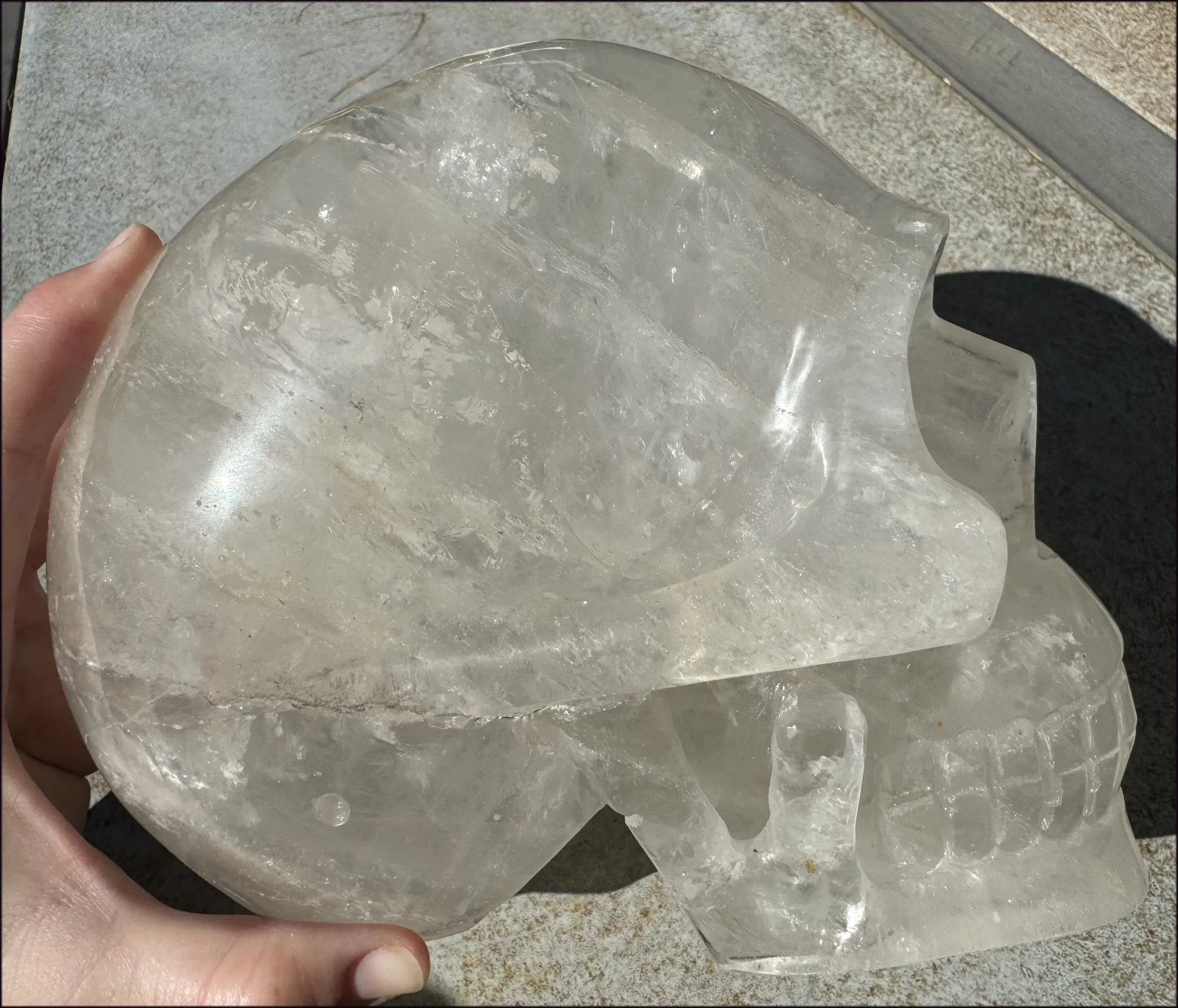 LifeSize Himalayan Quartz Crystal Skull with Multi-Colored Hematite, Shimmery Rainbows - 11lbs 