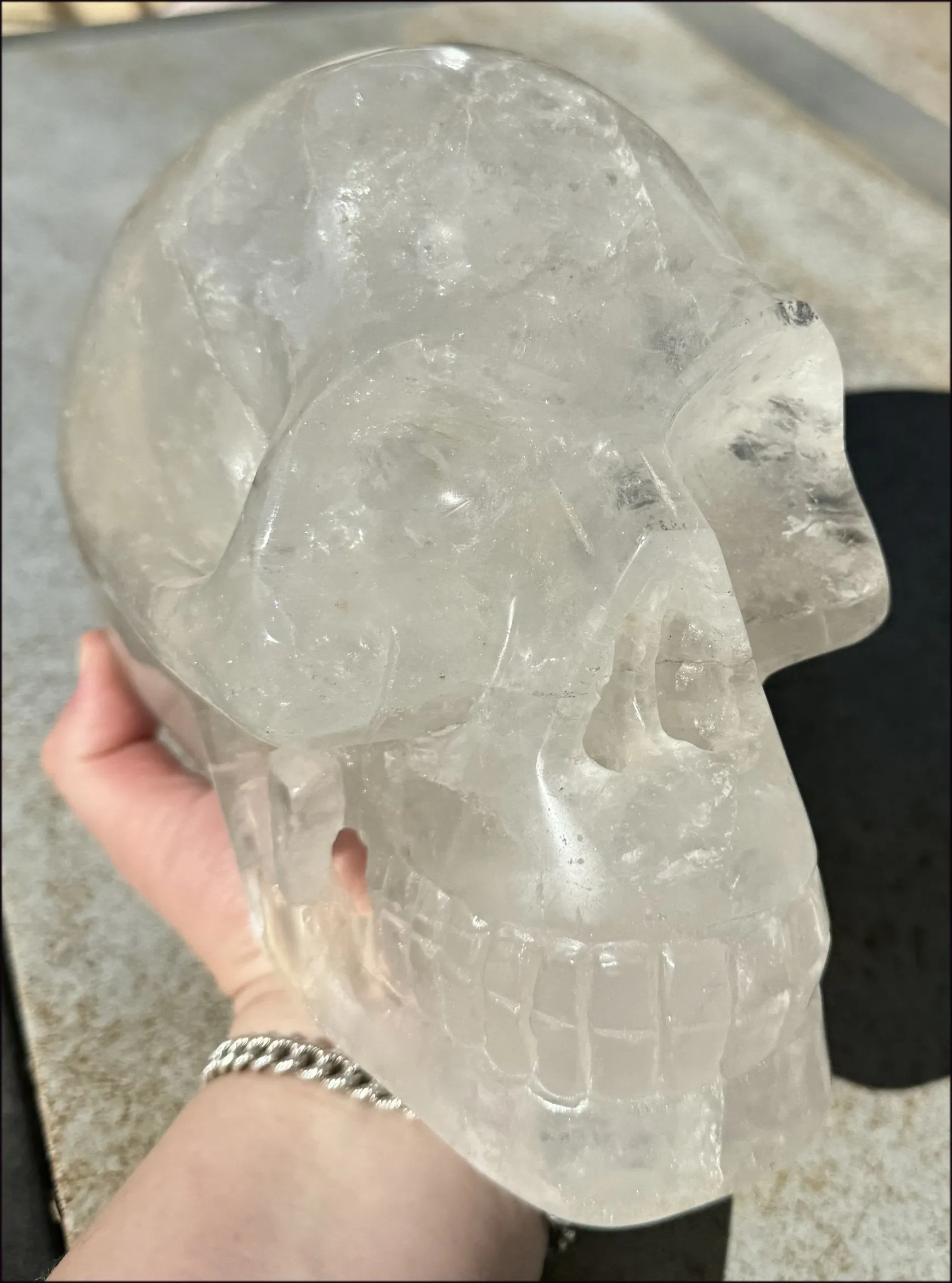 LifeSize Himalayan Quartz Crystal Skull with Multi-Colored Hematite, Shimmery Rainbows - 11lbs 
