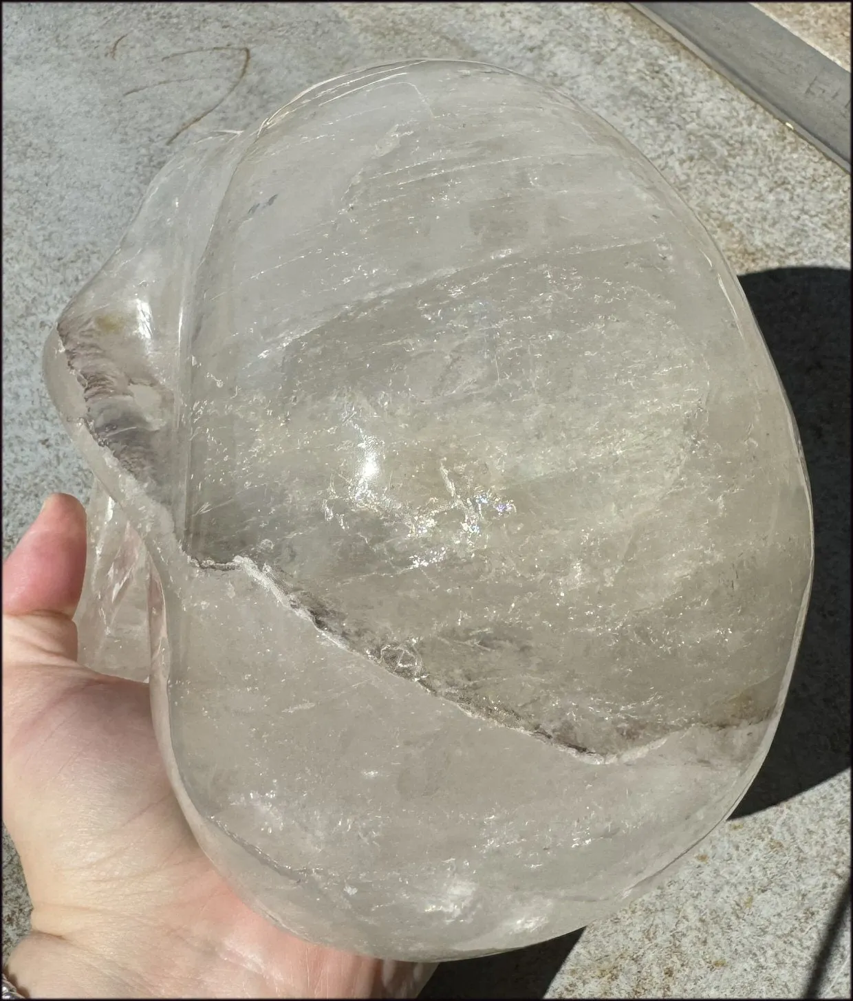 LifeSize Himalayan Quartz Crystal Skull with Multi-Colored Hematite, Shimmery Rainbows - 11lbs 