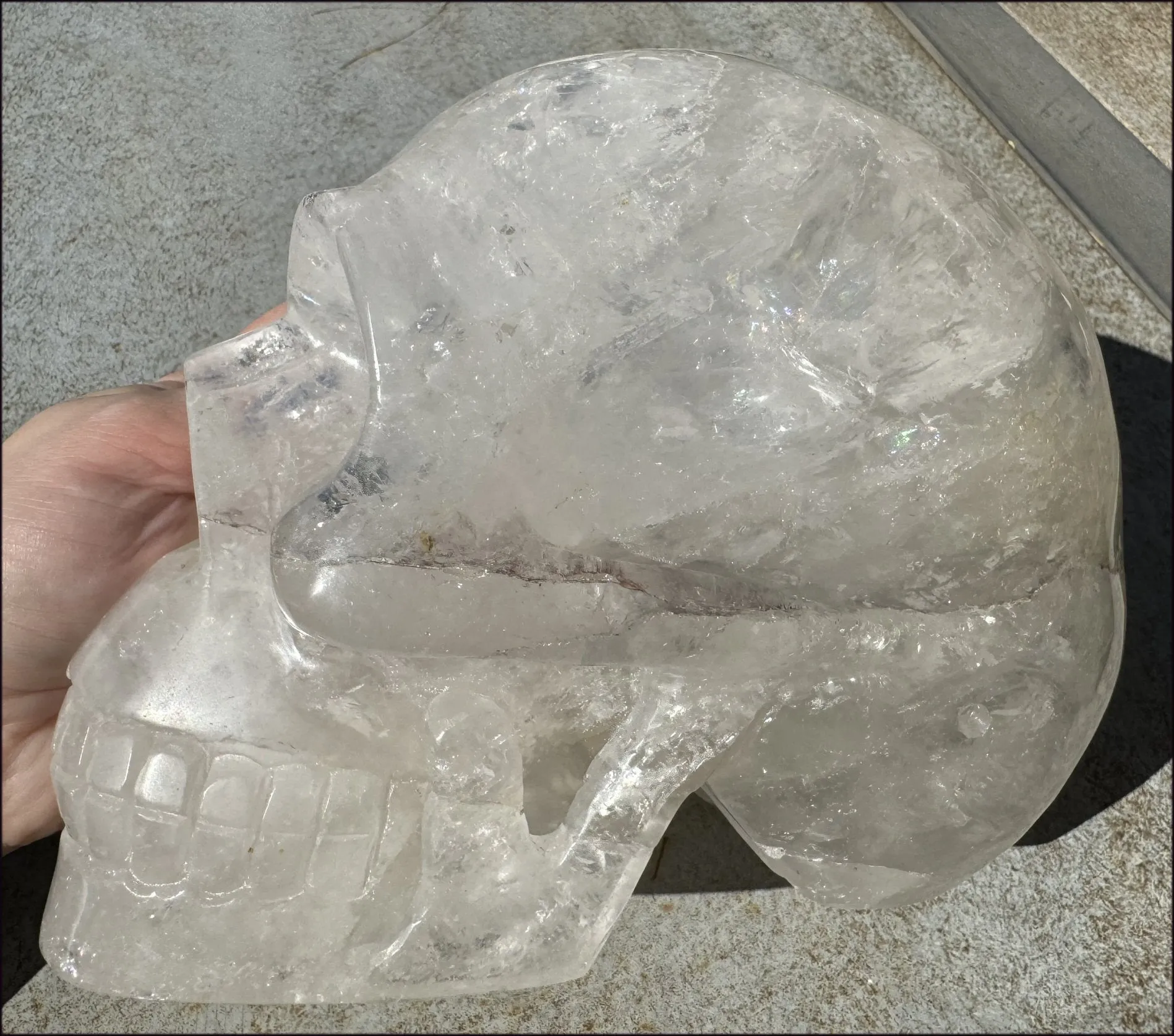 LifeSize Himalayan Quartz Crystal Skull with Multi-Colored Hematite, Shimmery Rainbows - 11lbs 