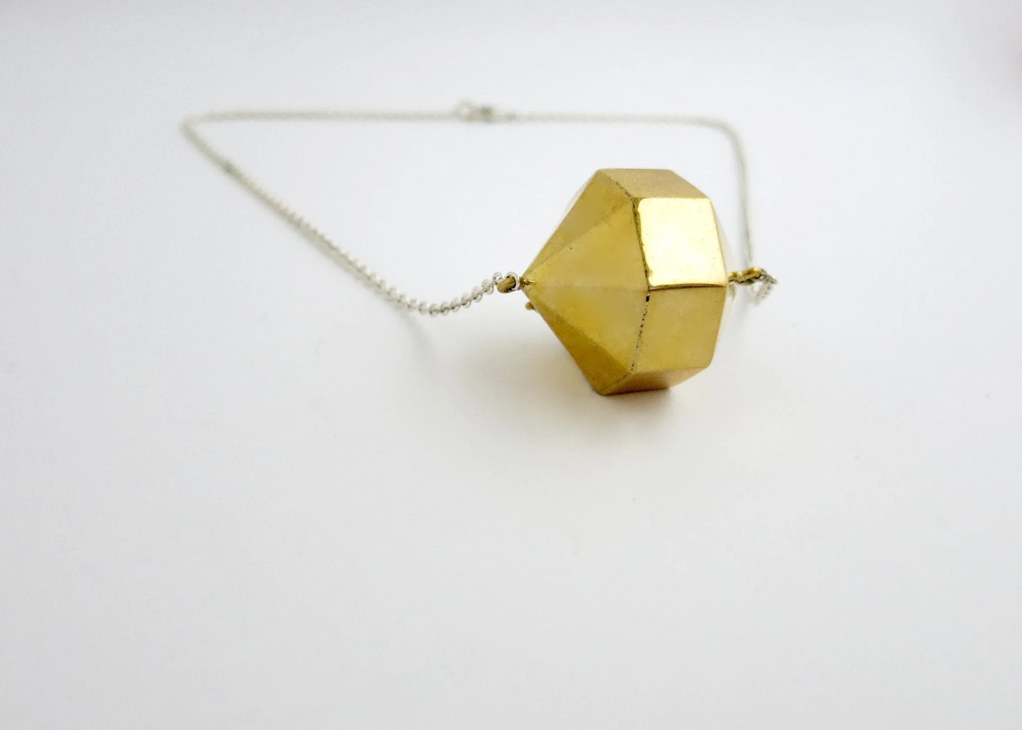 Super chic, minimalist, polygon locket in gold-plated brass with sterling silver chain