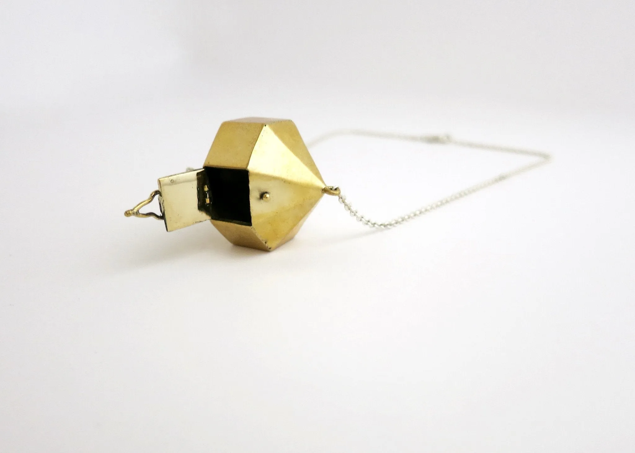 Super chic, minimalist, polygon locket in gold-plated brass with sterling silver chain